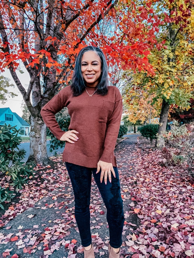 brown sweater outfit with fall background