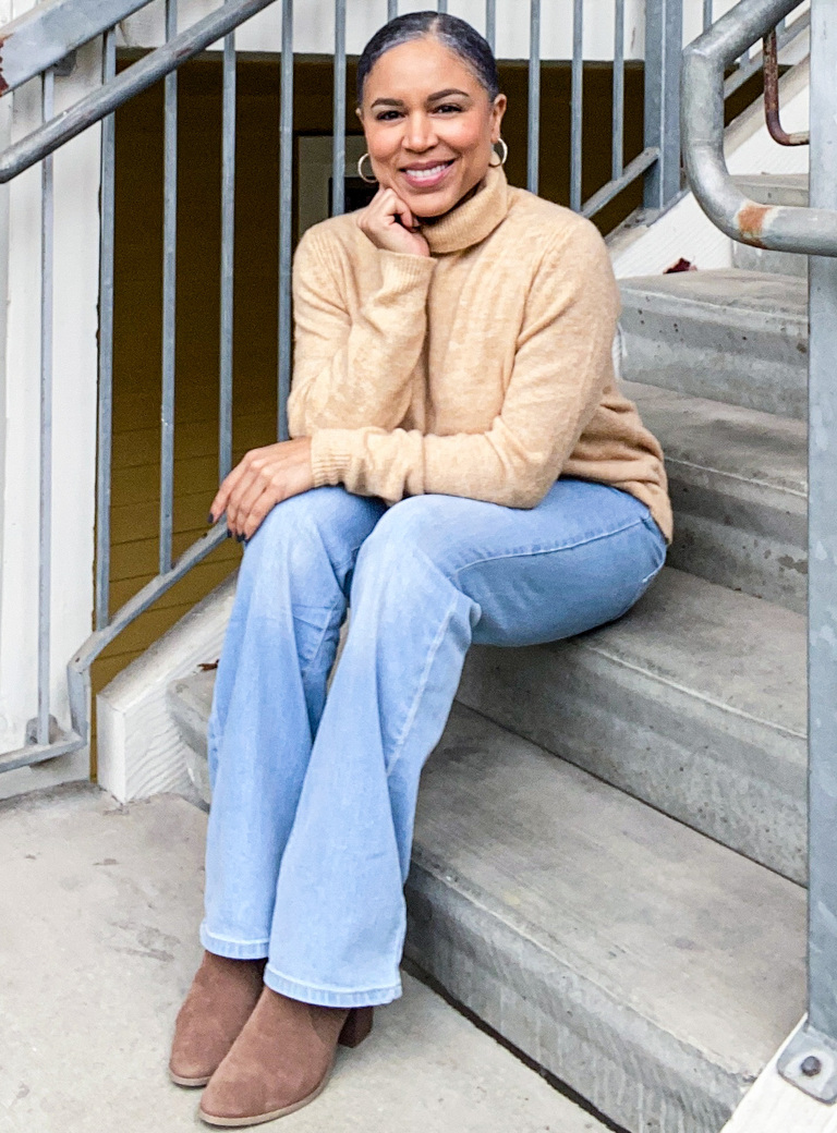 Beige turtleneck sweater and bootcut jeans outfit