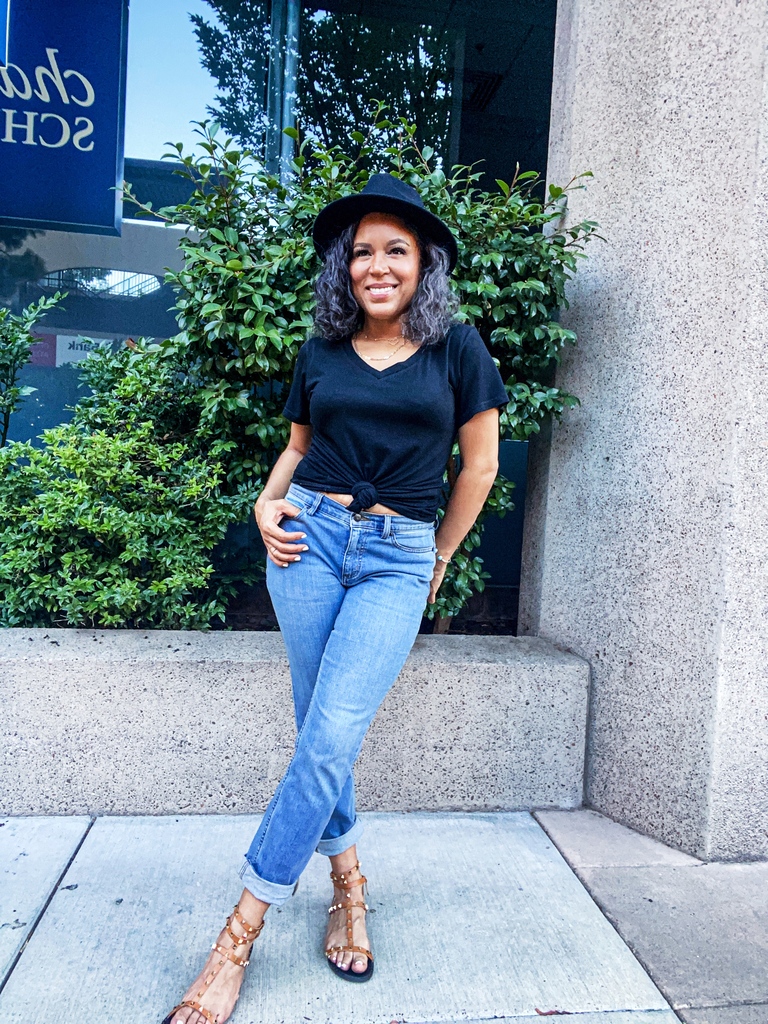 black v-neck tee and jeans