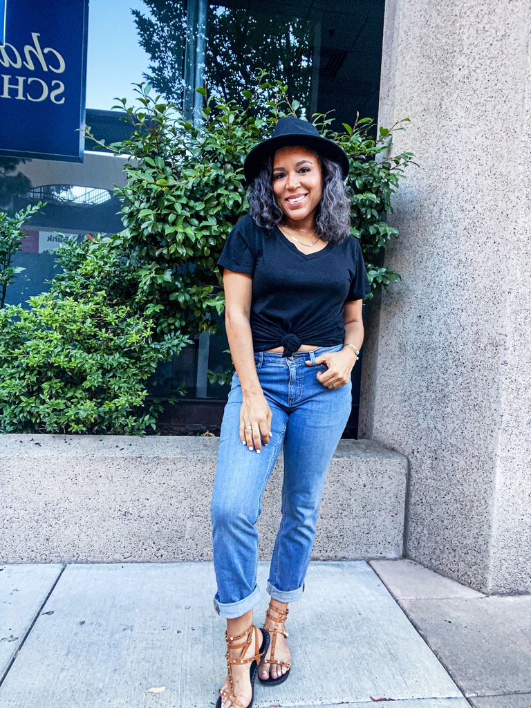 black v-neck tee and jeans