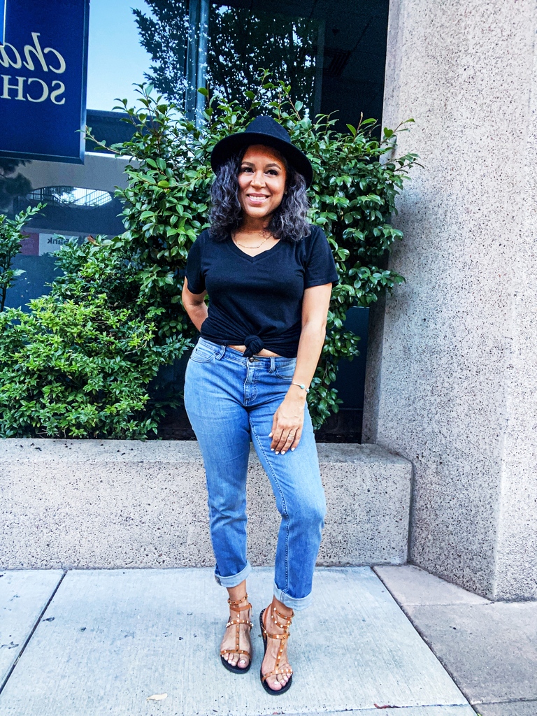 black v-neck tee and jeans